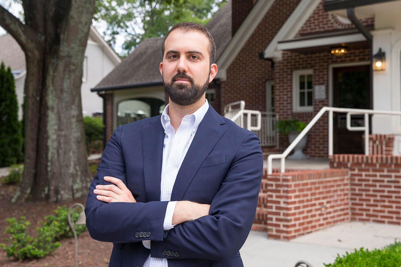 Restaurant owner Ryan Pernice stands for a portrait in front of Osteria Mattone in downtown Roswell, Wednesday, June 19, 2019.  (Alyssa Pointer/alyssa.pointer@ajc.com)