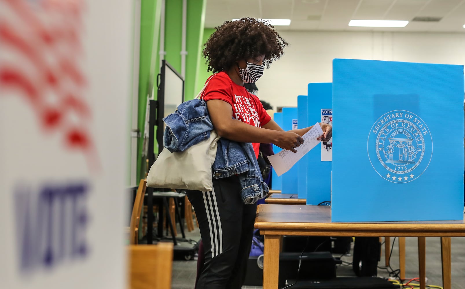 PHOTOS: Georgia voters struggle with long lines, new equipment, social distancing