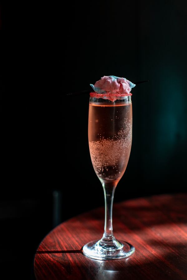 Cotton candy floats above Vesper's Halloween variation on a French 75. (Courtesy of Vesper)