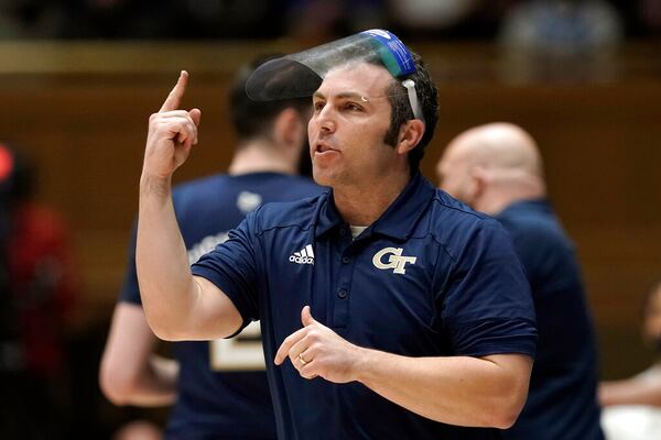 Georgia Tech head coach Josh Pastner directs his team during the first half of an NCAA college basketball game against Duke in Durham, N.C., Tuesday, Jan. 4, 2022. (AP Photo/Gerry Broome)