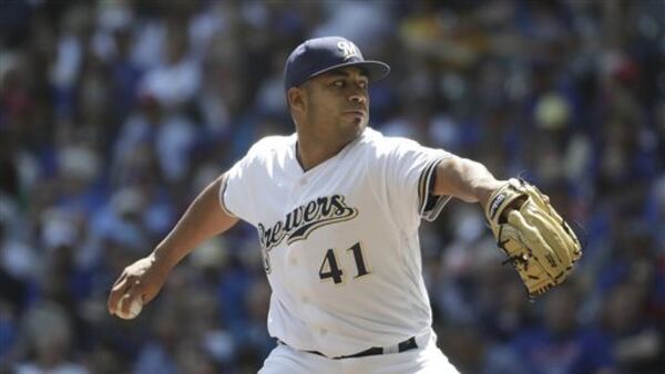 Junior Guerra, a 31-year-old rookie making his fifth start Wednesday against the Braves, began his pro career as a minor league catcher in the Braves organization more than a decade ago. (AP photo)