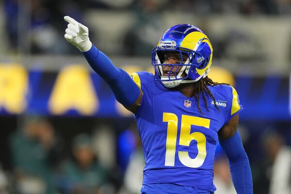 Los Angeles Rams wide receiver Demarcus Robinson (15) gestures during the first half of an NFL football game against the Philadelphia Eagles in Inglewood, Calif., Sunday, Nov. 24, 2024. (AP Photo/Mark J. Terrill)