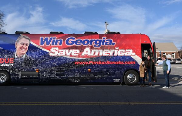 December 30, 2020 Dalton - U.S. Sen. David Perdue arrives for his campaign event at Cherokee Brewing + Pizza Company in downtown Dalton on Wednesday, December 30, 2020. The North Georgia county now has the highest infection rate among Georgia’s 159 counties, with one in 10 Whitfield residents testing positive for COVID-19. Seeking to boost Republican turnout for Georgia’s U.S. Senate runoffs, President Donald Trump is planning to hold a rally Monday at the regional airport in Dalton, an event organizers expect will attract as many as 20,000 people. (Hyosub Shin / Hyosub.Shin@ajc.com)