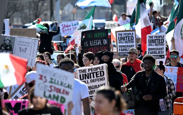 Earlier this month, about 1,000 pro-immigration protesters gathered along Buford Highway the immigrant hub of metro Atlanta, to call for an end to the targeted operations by immigration agents. (Hyosub Shin / AJC)