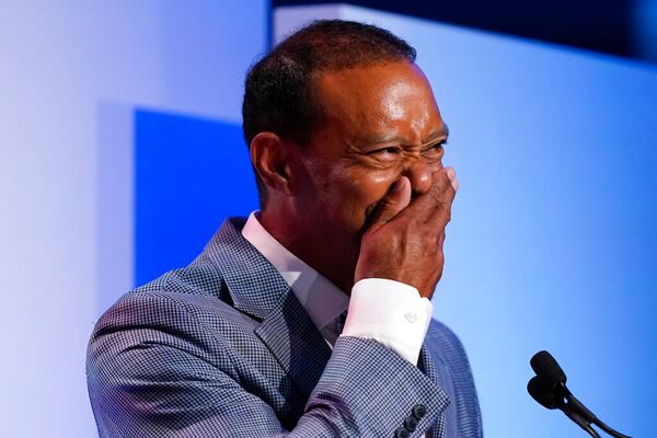 Tiger Woods becomes emotional during his induction into the World Golf Hall of Fame Wednesday, March 9, 2022, in Ponte Vedra Beach, Fla. (AP Photo/Gerald Herbert)