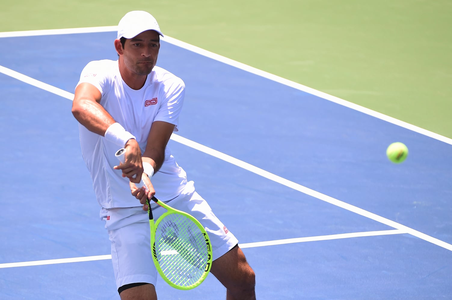 Photos: Former Bulldog John Isner competes in Atlanta Open