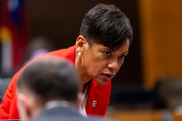 Chief Deputy District Attorney Adriane Love confers during the YSL trial at Fulton County Courthouse in Atlanta on Monday, Nov. 25, 2024. The racketeering trial, the longest in Georgia's history, came to an end on Tuesday, Dec. 3, after almost a year after opening statements took place. (Arvin Temkar/AJC)