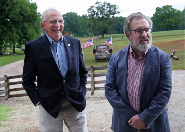 U.S. Environmental Protection Agency (EPA) Administrator Andrew Wheeler (right) shares a laugh with Georgia Agriculture Commissioner Gary Black (left) while kicking off his Georgia swing at Southern Belle Farm on Wednesday, May 27, 2020, in McDonough.  Curtis Compton ccompton@ajc.com