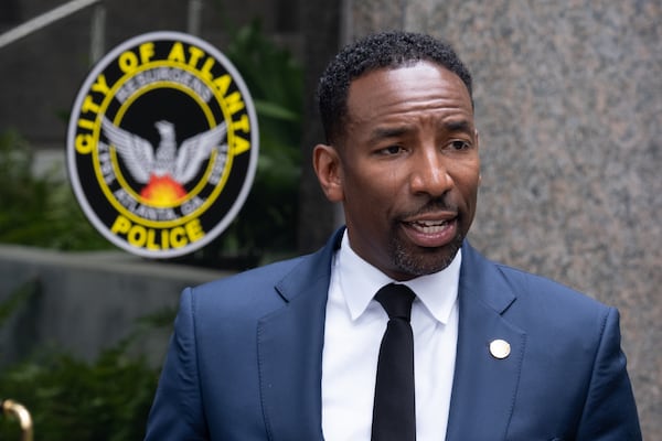 220629-Atlanta-Atlanta Mayor Andre Dickens talks with journalists following a ribbon-cutting for a new police mini-precinct in Buckhead Village on Wednesday, June 29, 2022.  Ben Gray for the Atlanta Journal-Constitution