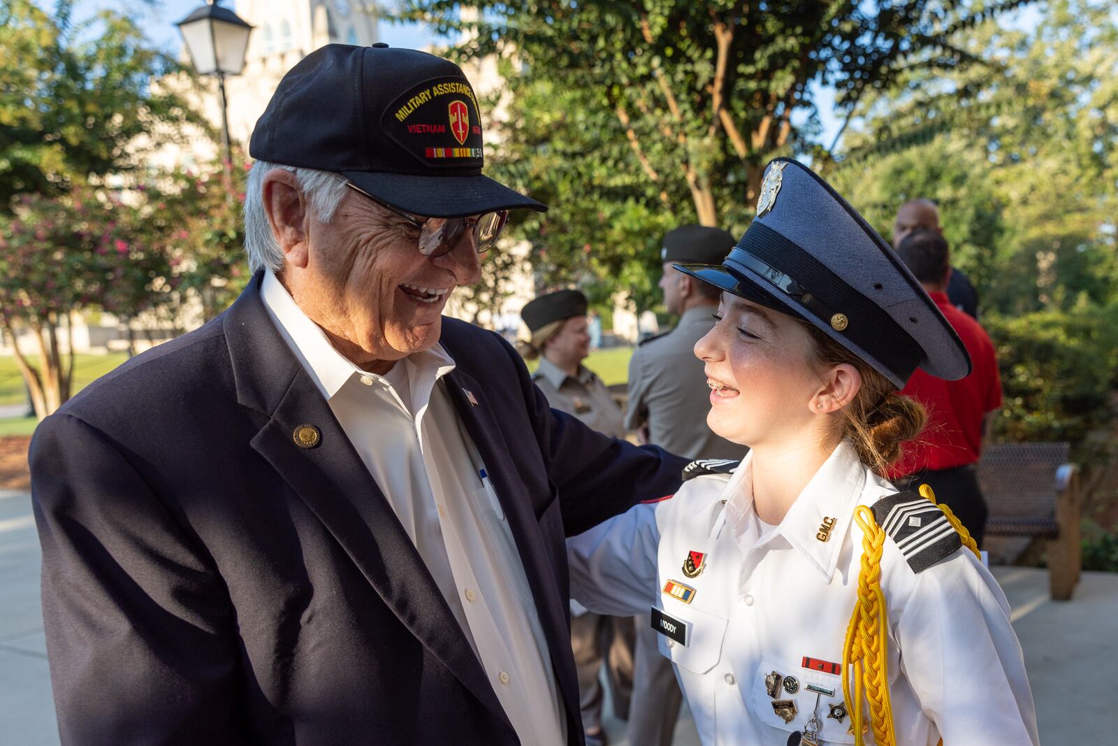 Richard Moody greets his granddaughter, Kylie Moody, during the annual Patriot Day Ceremony at Georgia Military College in Milledgeville. (Arvin Temkar / arvin.temkar@ajc.com)