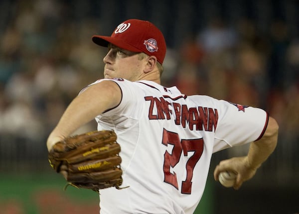 On a night when Jordan Zimmermann didn't have his usual pinpoint command, he still limited the Braves to two hits and one run in six innings of a 15-1 Nationals blowout win Thursday. (AP photo)