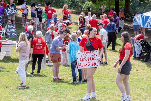 People gather in Piedmont Park before a rally organized by Georgia Moms Demand Action on Saturday, May 13, 2023. The rally was part of a national series of protests the day before Mother’s Day to highlight the mounting toll of gun violence.  (Steve Schaefer/steve.schaefer@ajc.com)