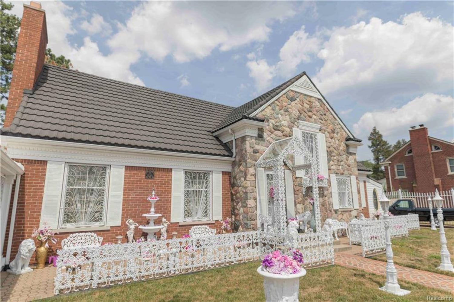 Photos: Inside $550K Lion Gate Estate, whimsical home with carpeted ceilings, vintage cars