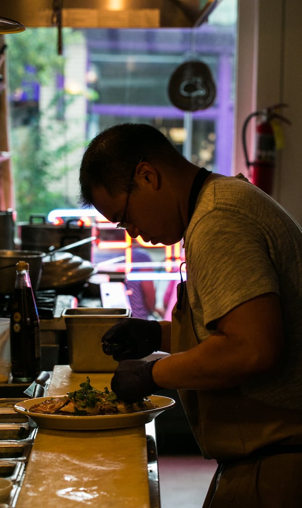 Chef Parnass Savang works the line at Talat Market. / (Jenni Girtman/ Atlanta Event Photography)