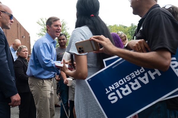 Kentucky Gov. Andy Beshear campaigns for Vice President Kamala Harris at an event in Cumming on Sunday.