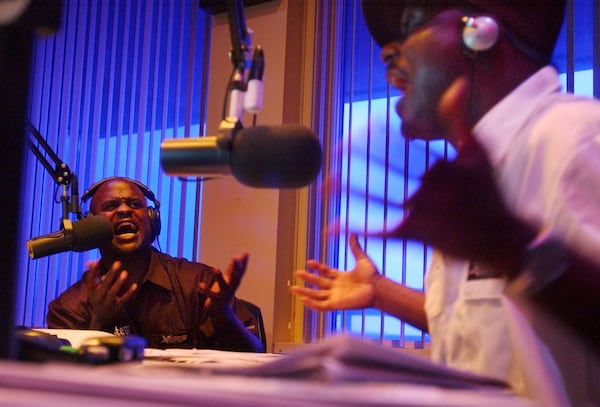 050620 - ATLANTA, GA -- From left: Ryan and Doug Stewart (cq), who are brothers, are pictured on the air during their "2 Live Stews" show on Sports Talk 790, The Zone Monday, June 20, 2005. (T. LEVETTE BAGWELL/AJC staff)