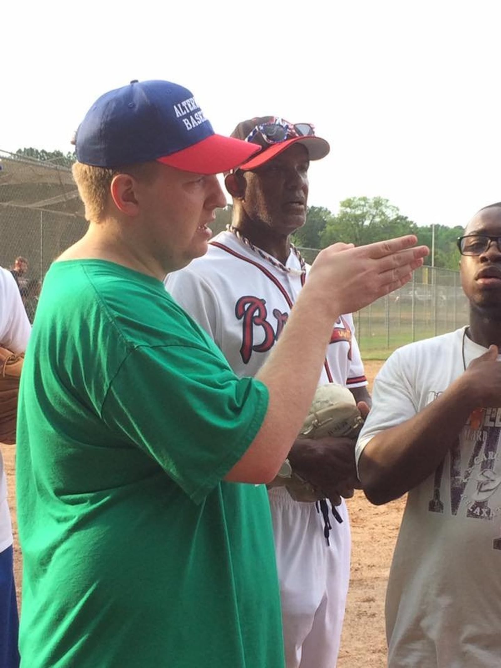 Taylor Duncan (left) confers with players during last year’s All-Star Game. Duncan founded the Alternative Baseball Organization after being rejected by traditional youth baseball leagues. CONTRIBUTED BY SCORE PHOTO