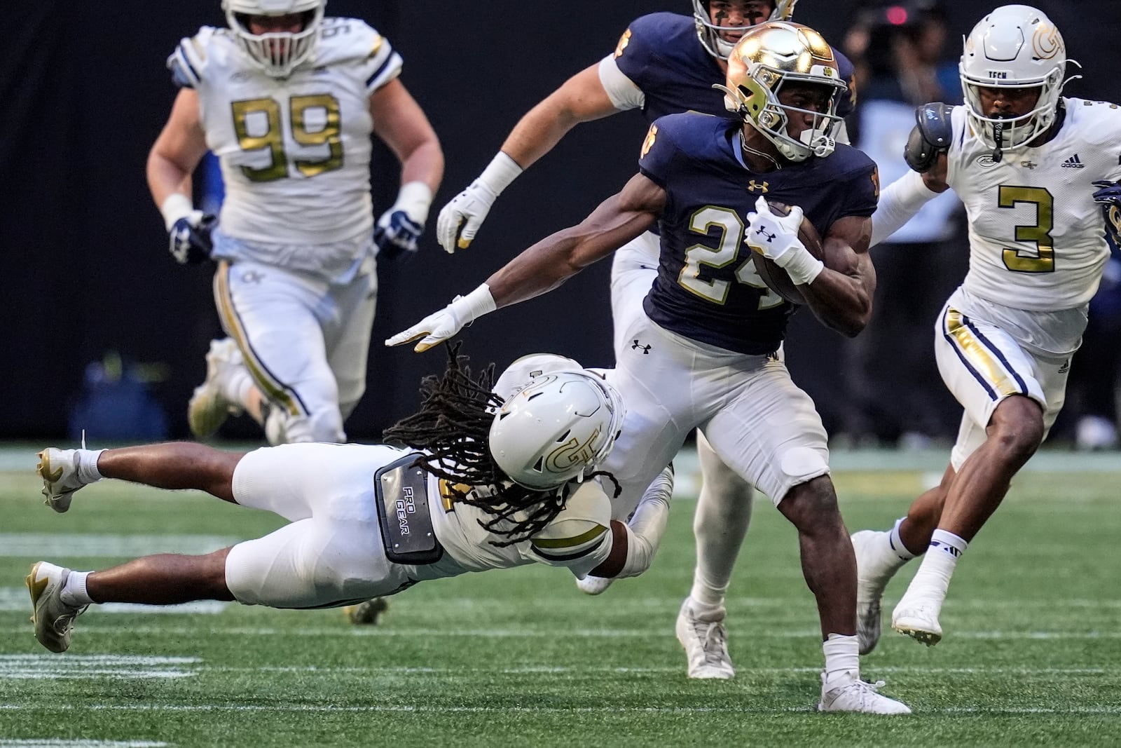 Notre Dame running back Jadarian Price (24) runs against Georgia Tech during the first half of an NCAA college football game, Saturday, Oct. 19, 2024, in Atlanta. (AP Photo/Mike Stewart)