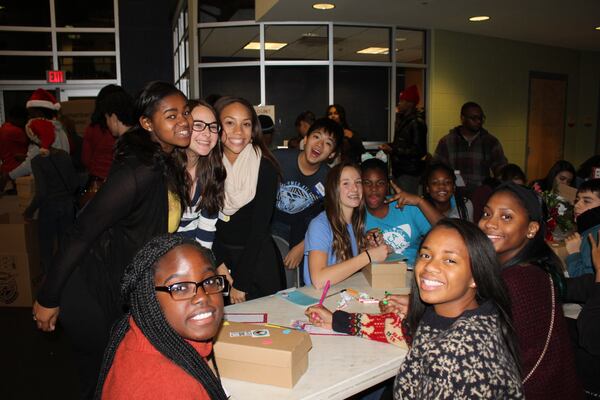 More than 275 teens at YMCA's throughout metro Atlanta are hoping to put together 1,000 gift boxes for children in need around the globe.