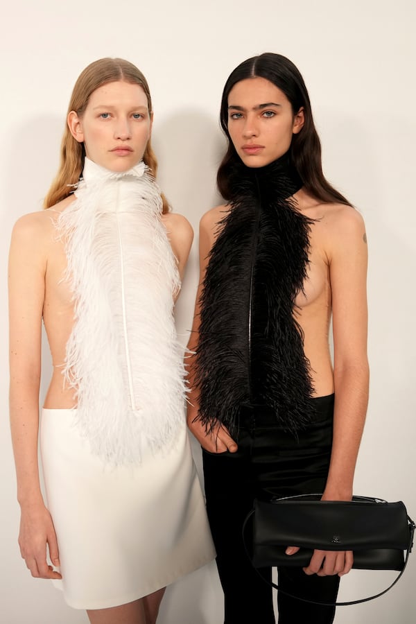 Models wear backstage creations as part of Courreges Fall/Winter 2025-2026 Womenswear collection presented Wednesday, March 5, 2025. in Paris. (Photo by Scott A Garfitt/Invision/AP)