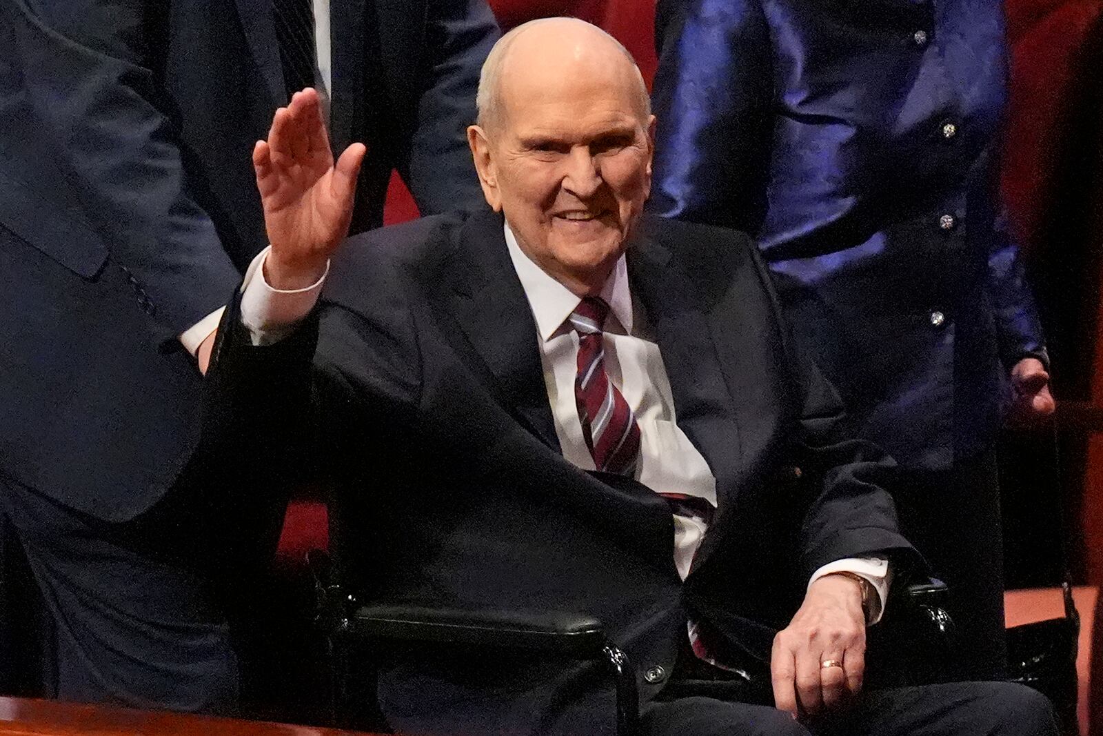 FILE - President of The Church of Jesus Christ of Latter-day Saints Russell M. Nelson waves as he departs the church's twice-annual conference, April 7, 2024, in Salt Lake City. (AP Photo/Rick Bowmer, File)