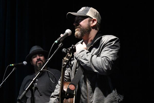  Kristian Bush shares a moment with the Eddie's Attic crowd. Photo: Melissa Ruggieri/AJC