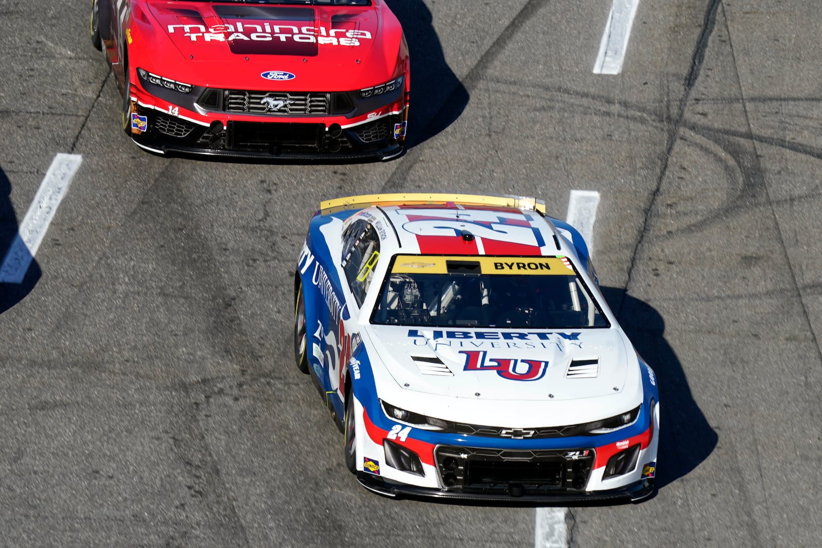 William Byron (24) drives into Turn 1 during a NASCAR Cup Series auto race at Martinsville Speedway in Martinsville, Va., Sunday, Nov. 3, 2024. (AP Photo/Chuck Burton)