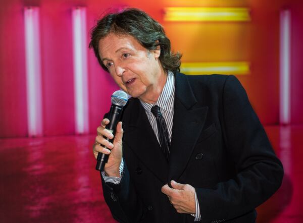 LONDON, ENGLAND - OCTOBER 18: Paul McCartney meets fans and signs copies of his album 'New' at HMV, Oxford Street on October 18, 2013 in London, England. (Photo by Ian Gavan/Getty Images) Paul McCartney is scheduled to perform with Ringo Starr on Sunday on the Grammy Awards. CREDIT: Getty Images