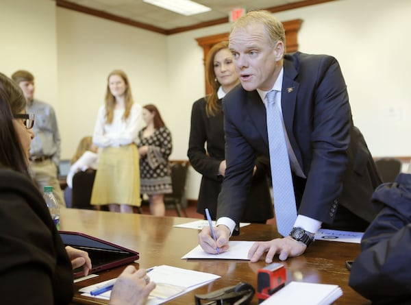 Clay Tippins in Atlanta on March 7, 2018, as he filed his qualifying paperwork to be a Republican candidate for governor of Georgia. He was accompanied by his wife, Lori. 