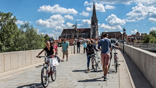 The stone bridge over the Danube, built in 1146, connects Regensburg's "new" town with the historic "old" town on the far side. At rear, the Strudel Tower, so-named for "the whirlpool eddies, or strudels, in the river below," said City guide Ulrike Unger. The oldest of Regensburg's 20 towers, they count less than half of the 50 towers that once graced this medieval town. (Steve Haggerty/Colorworld/TNS)