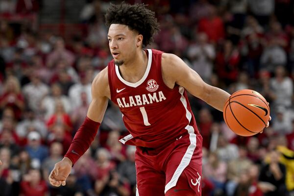 FILE - Alabama guard Mark Sears (1) runs a play against Arkansas during an NCAA college basketball game Saturday, Feb. 8, 2025, in Fayetteville, Ark. (AP Photo/Michael Woods, FIle(