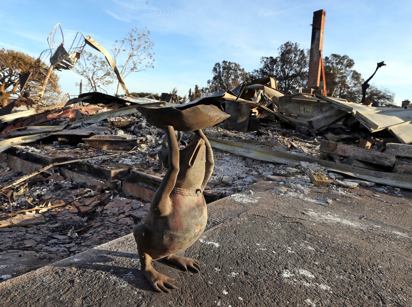 Photos: California wildfires kill dozens, destroy entire town