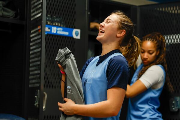 Columbia guard Mia Broom laughs as she gets settled in the locker room at Carmichael Arena on the campus of the University of North Carolina in Chapel Hill, N.C., Wednesday, March 19, 2025, before their First Four basketball game in the NCAA Tournament against Washington on March 20. (AP Photo/Nell Redmond)