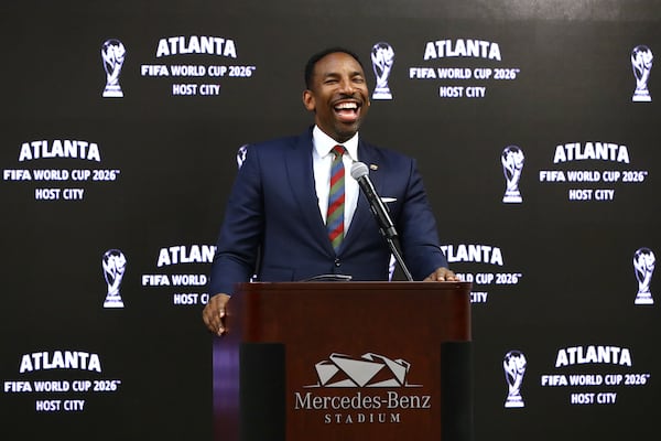 Mayor Andre Dickens is all smiles reacting during the Host City announcement press conference for the 2026 World Cup at Mercedes-Benz Stadium on Thursday, June 16, 2022, in Atlanta.  (AJC 2022)