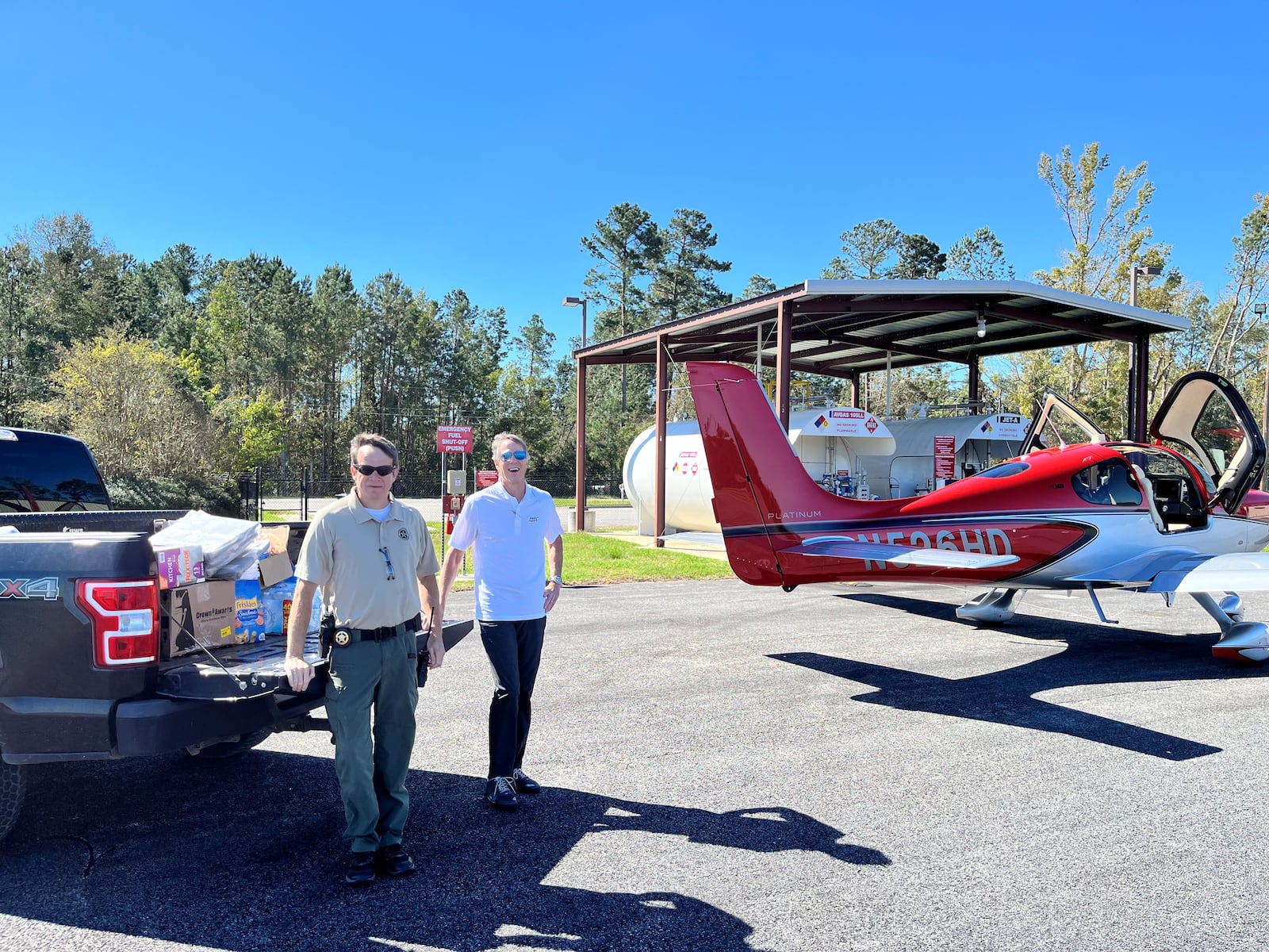 Bert Light (right) is a volunteer pilot who delivered supplies with his plane after Hurricane Helene across the region, including to Metter, Georgia, on Thursday, Oct. 3, 2024. Contributed