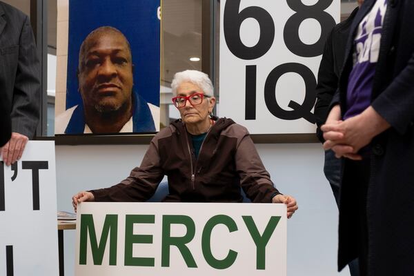 May Helen, who goes by Junior Abraham, sits in the Board of Pardons and Paroles office while helping deliver a petition to commute Willie James Pye’s death sentence with a group from Georgians for Alternatives to the Death Penalty on Monday, March 18, 2024.   (Ben Gray / Ben@BenGray.com)