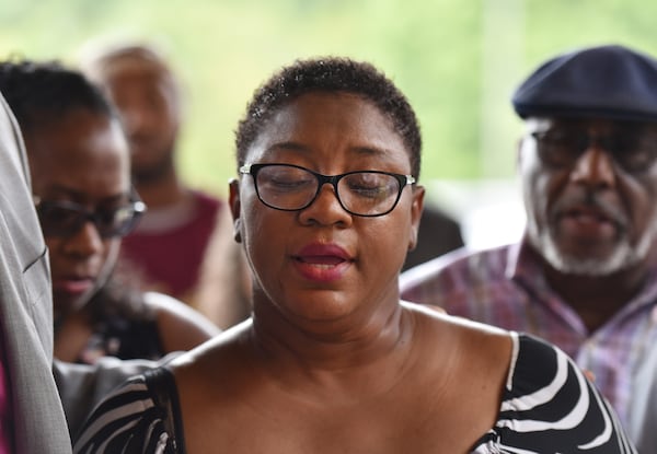 Tamara Cotman, who was convicted in the Atlanta Public Schools test-cheating case, reacts as she turns herself in at the Fulton County Jail in Atlanta on Tuesday, October 9, 2018. HYOSUB SHIN / HSHIN@AJC.COM