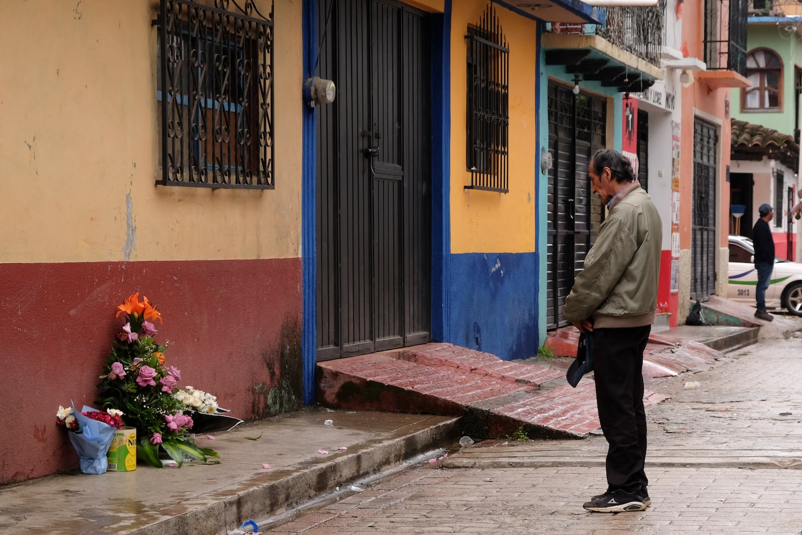 A man prays in front of an altar where Catholic priest Marcelo Perez died in an armed attack after attending mass at a church in San Cristobal de las Casas, Chiapas state, Mexico, Sunday, Oct. 20, 2024. (AP Photo/Isabel Mateos)