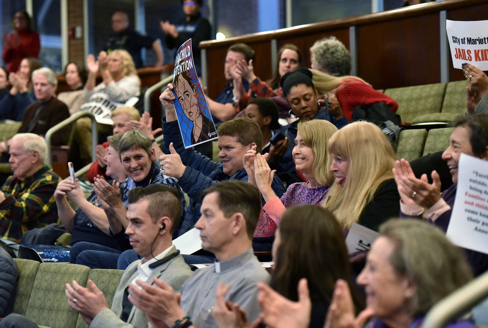 December 11, 2019 Marietta - Members of audience react after the city council reversed the proposal during Marietta City Council special meeting on Wednesday, December 11, 2019. The Marietta City Council will consider whether to grant a variance to allow Freemont Grace Human Services to operate a shelter that would house unaccompanied immigrant children seized from the U.S.-Mexico border. Mitchell Bryant, a pastor and managing partner with the organization, wants to use a vacant building at 119 Powers Ferry Road to house up to 50 children in custody of the U.S. Department of Health and Human Services. Bryant obtained approval in October from the cityâs Zoning Board of Appeals to use the building as a shelter. (Hyosub Shin / Hyosub.Shin@ajc.com)