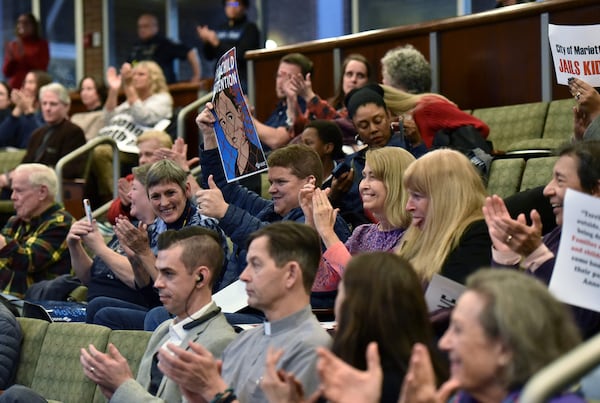 December 11, 2019 Marietta - Members of audience react after the city council reversed the proposal during Marietta City Council special meeting on Wednesday, December 11, 2019. The Marietta City Council will consider whether to grant a variance to allow Freemont Grace Human Services to operate a shelter that would house unaccompanied immigrant children seized from the U.S.-Mexico border. Mitchell Bryant, a pastor and managing partner with the organization, wants to use a vacant building at 119 Powers Ferry Road to house up to 50 children in custody of the U.S. Department of Health and Human Services. Bryant obtained approval in October from the cityâs Zoning Board of Appeals to use the building as a shelter. (Hyosub Shin / Hyosub.Shin@ajc.com)