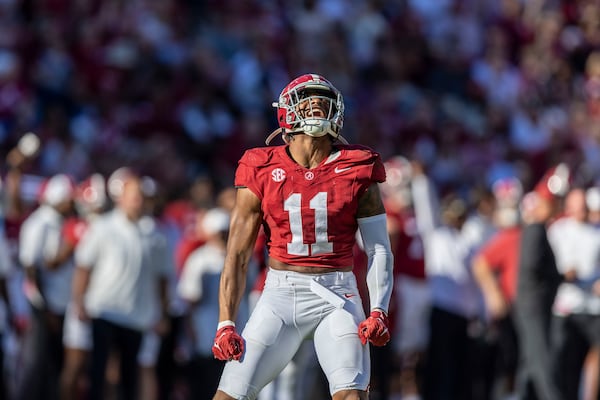 Alabama linebacker Jihaad Campbell (11) celebrates his sack against Mercer during the first half of an NCAA college football game, Saturday, Nov. 16, 2024, in Tuscaloosa, Ala. (AP Photo/Vasha Hunt)