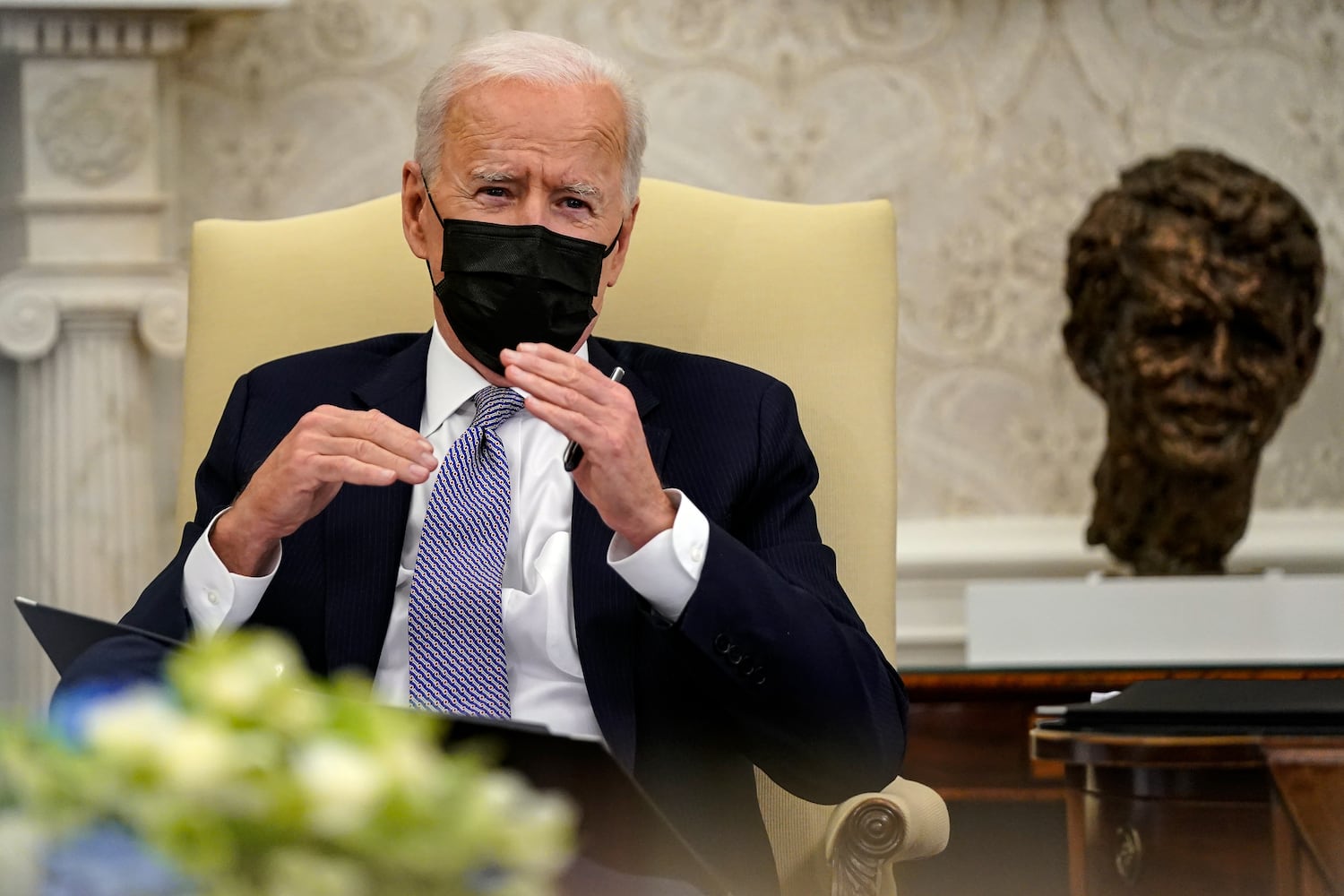 President Joe Biden addresses a bipartisan meeting about the American Jobs Plan, in the Oval Office of the White House in Washington on Monday, April 12, 2021. (Amr Alfiky/The New York Times)