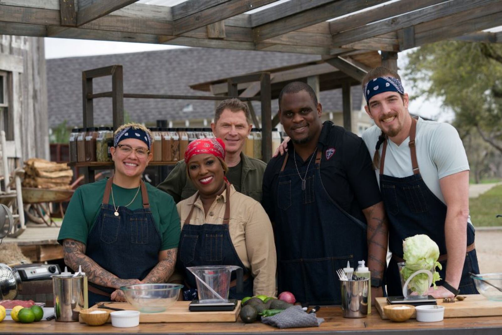 (l. to r.) Team Bobby members Sam Cruz, Erica Barrett, team captain Bobby Flay, Shannon Snell and Noah Sims on Food Network's 'BBQ Brawl.'