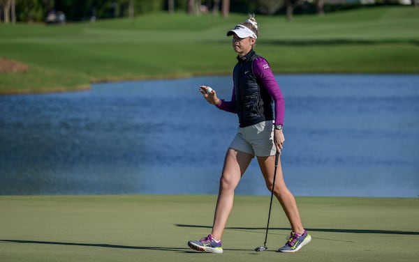 Nelly Korda walks across the ninth green during the first round of the LPGA Annika golf tournament at Pelican Golf Club, Thursday, Nov. 14, 2024, in Belleair, Fla. (AP Photo/Steve Nesius)