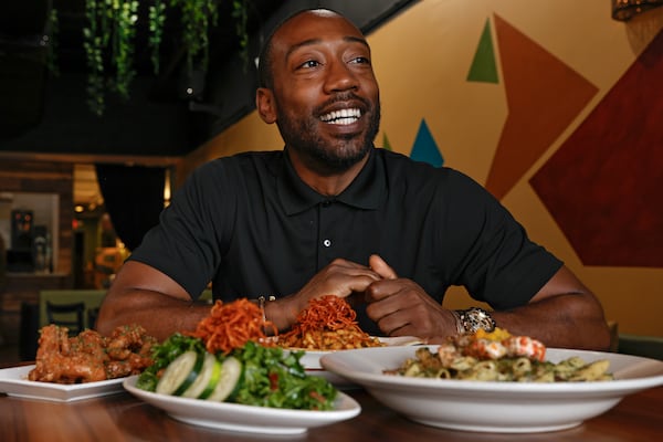 Issa Prescott is the owner of Life Bistro in Sylvan Hills. Natrice Miller/natrice.miller@ajc.com