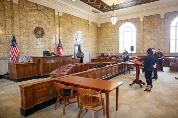 Two family members of Clarence Henderson speak to Judge Erica Tisinger, left, as murder charges were dropped against Clarence Henderson in a historic court hearing at the Carroll County Courthouse, Thursday, March 2, 2023, in Carrollton, Ga. Jason Getz / Jason.Getz@ajc.com)
