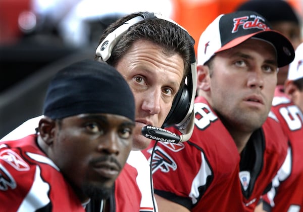 Quarterback Michael Vick, left, helped revitalize the Falcons.