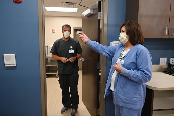 Chief Nursing Officer Shawn Whittaker, right, talks with Pharmacist Tracy Odom at Miller Pharmacy in Colquitt on Monday. The Hospital Authority of Miller County (HAMC) will open a new retail pharmacy this fall. (Hyosub Shin / Hyosub.Shin@ajc.com)