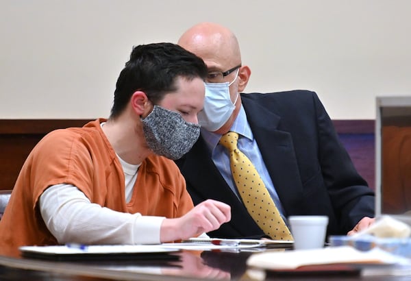 Jacob Kaderli confers with his attorney John Lovell (right) during a preliminary hearing for Michael Helterbrand and Jacob Kaderli at Floyd County Superior Court in Rome on Friday, May 29, 2020. Jacob Kaderli and Michael Helterbrand were in court Friday for a preliminary hearing and another attempt to get bond set for their charges of attempted murder. Luke Lane, Jacob Kaderli and Michael Helterbrand are accused belonging to an international terror group called The Base and of plotting the murder of a Bartow County couple they believed to be involved in anti-racist demonstrations. HYOSUB SHIN / HYOSUB.SHIN@AJC.COM