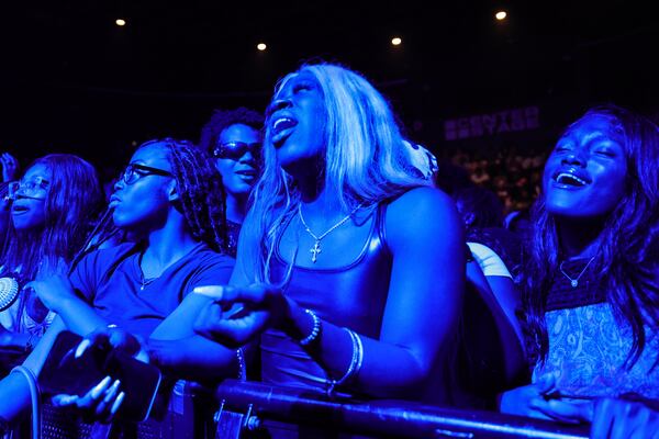 Fans sing and dance as British girl group Flo makes their North American debut at Center Stage Theater in Atlanta on Thursday, April 13, 2023. (Natrice Miller/ natrice.miller@ajc.com)